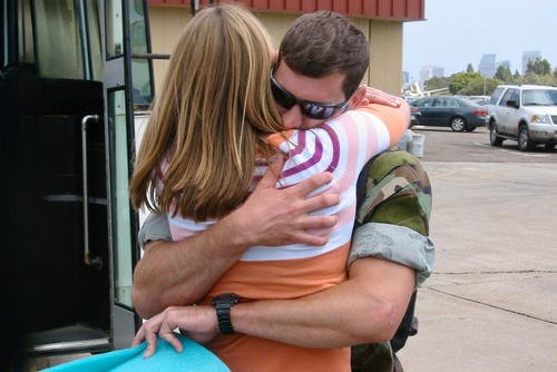 Navy spouse Peyton Roberts welcomes her husband home from a 7-month deployment.