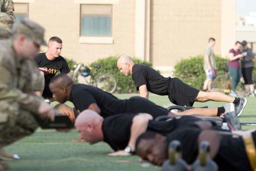 Soldiers complete pushups during an Army Combat Fitness Test