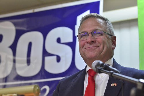 Rep. Mike Bost, R-Ill., smiles as he speaks to supporters during an election night rally at the Elks Lodge in Murphysboro, Ill.
