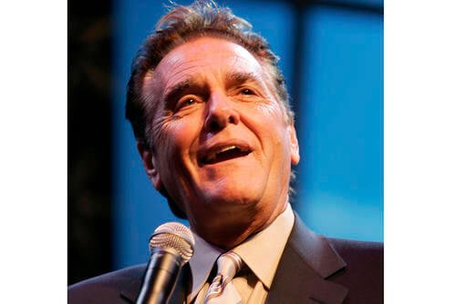 Chuck Woolery hosts a special premiere of the '$250,000 Game Show Spectacular' at the Las Vegas Hilton Saturday, Oct. 13, 2007, in Las Vegas. (Ronda Churchill/Las Vegas Review-Journal via AP, File)