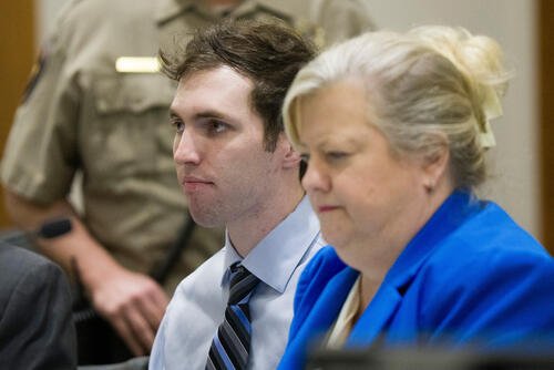 Tyler Robinson, accused in the fatal shooting of Charlie Kirk, sits beside defense attorney Kathryn Nester during a hearing in 4th District Court in Provo, Utah, on Friday, Jan. 16, 2026. (Bethany Baker/The Salt Lake Tribune via AP, Pool)