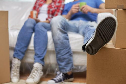 Couple with moving boxes